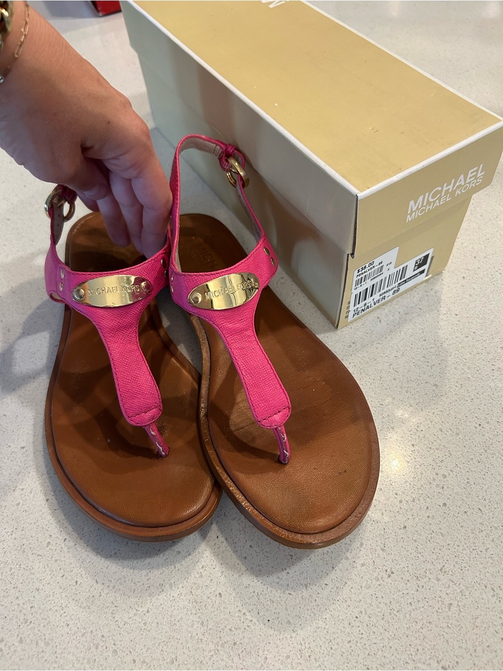 Michael Kors Pink Leather T-Strap Sandals with Gold Logo Plate